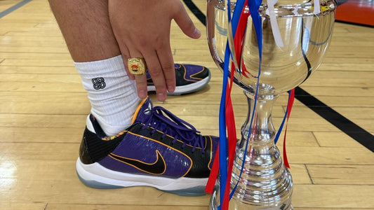 Basketball player wearing ASG grip socks for improved in-shoe stability and performance