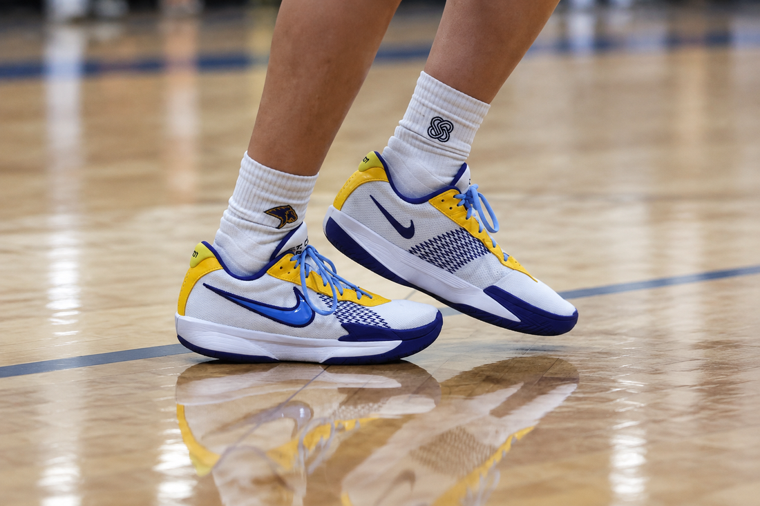 Basketball player wearing ASG performance basketball socks during a game