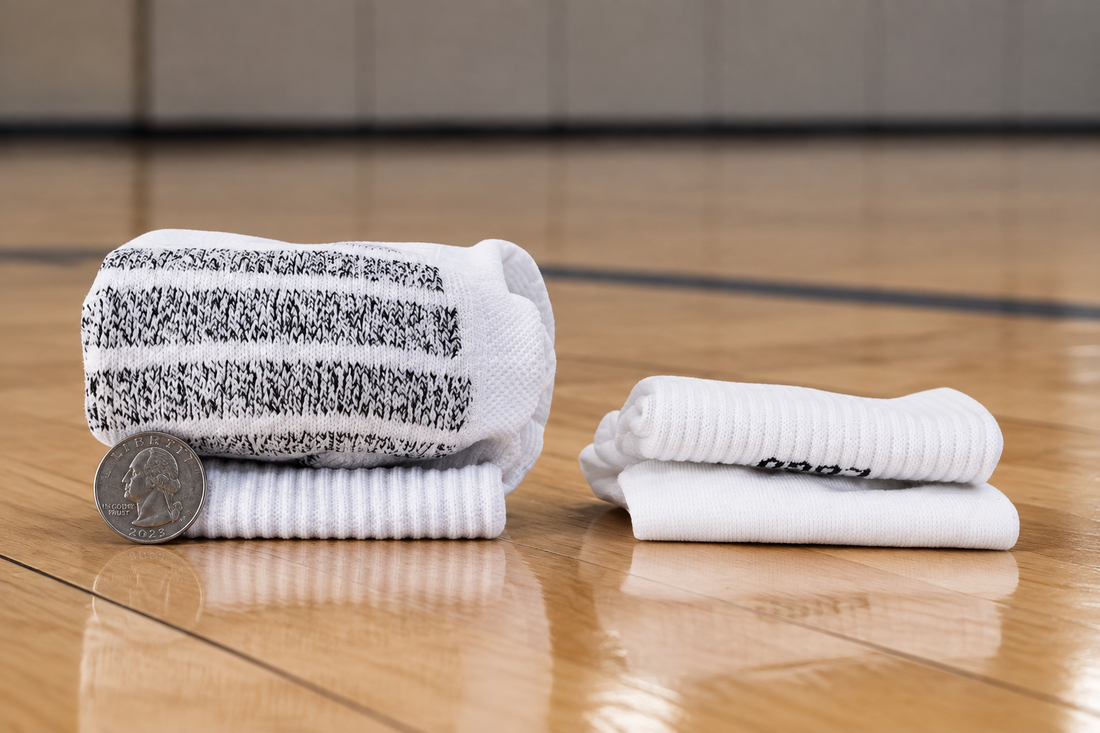 Basketball player wearing ASG performance socks for cushioning and comfort on the court
